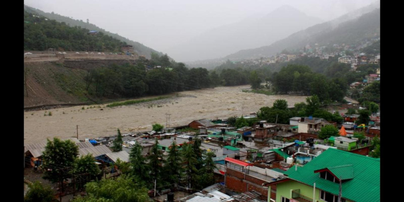 Cars are washed away by a flash flood at Bhagsunag, Himachal’s McLeodganj.