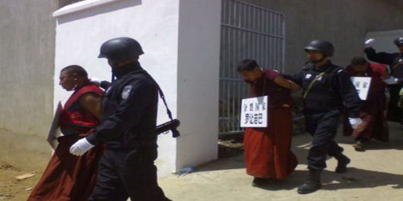 Tibetan monks have been charged with unknown offences in secret Chinese tribunals