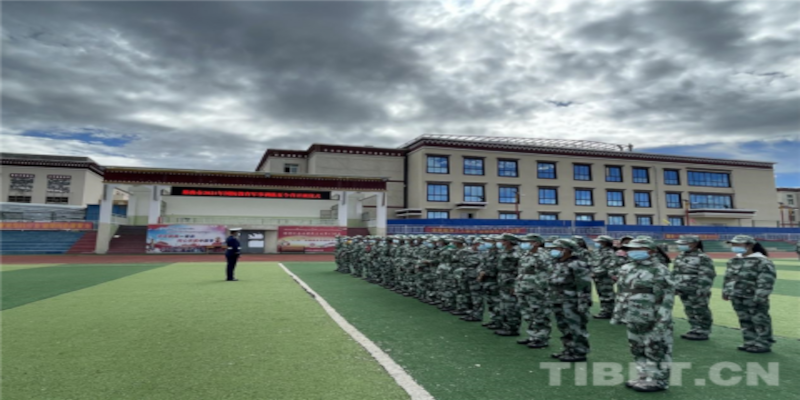 TIBETAN TEENAGERS BEGIN THEIR SCHOOL YEAR WITH MILITARY TRAINING.